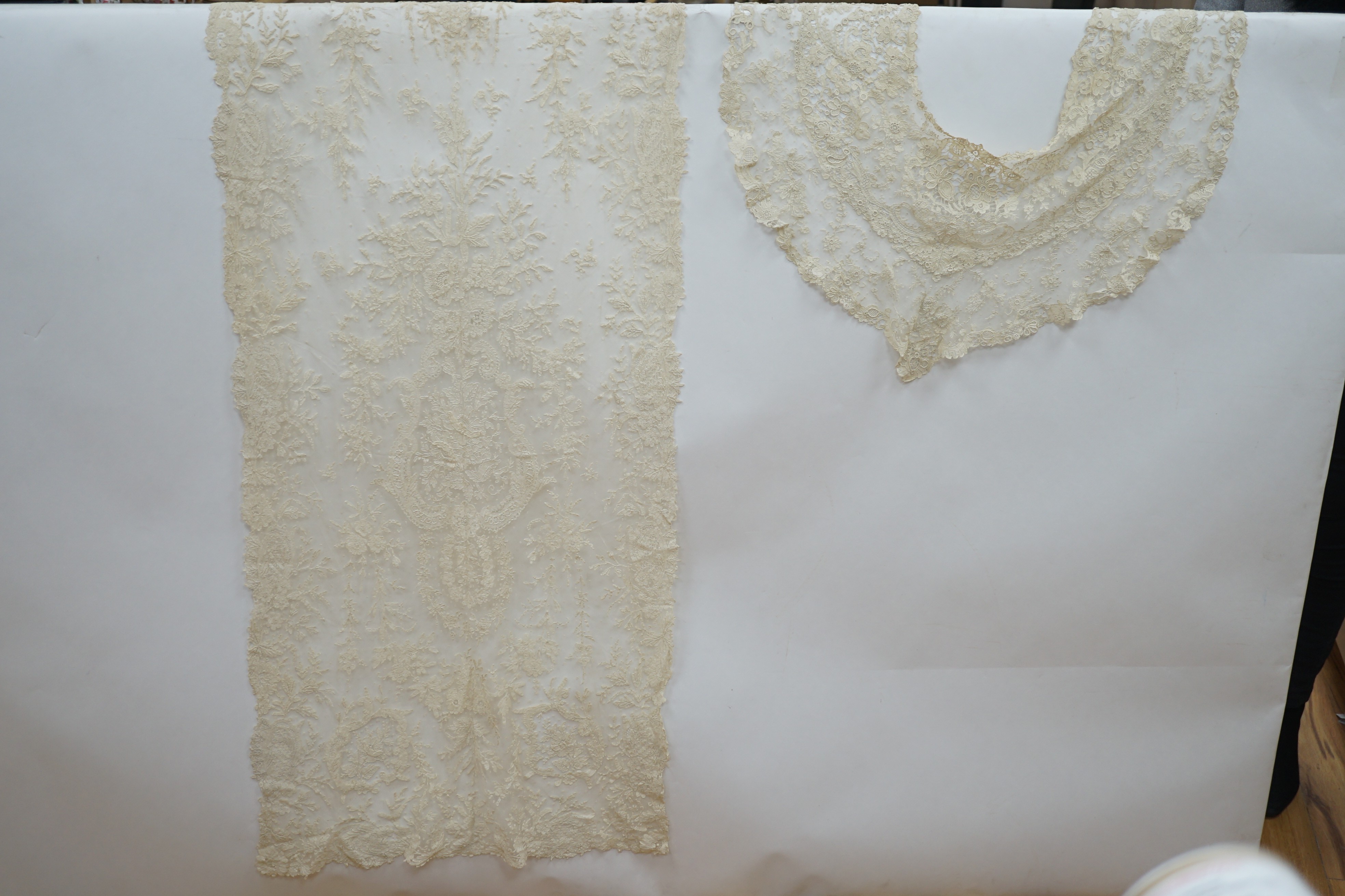 A mixed Brussels lace berth with fine needle lace floral insertions, together with a mixed bobbin veil and needleworked Brussels stols